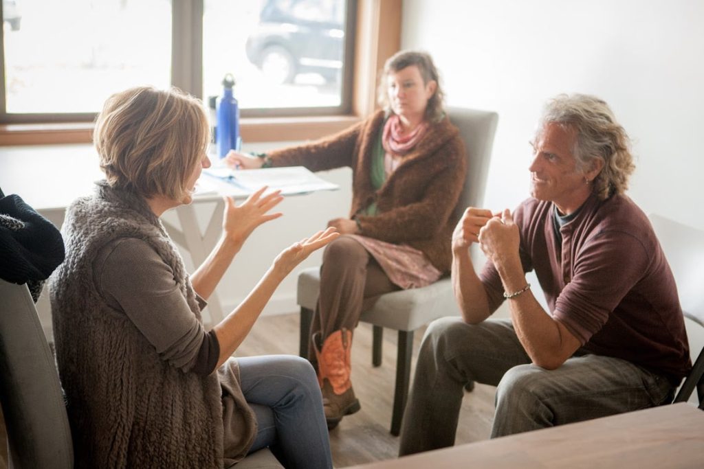 Couple having a consent conversation with a sex coach