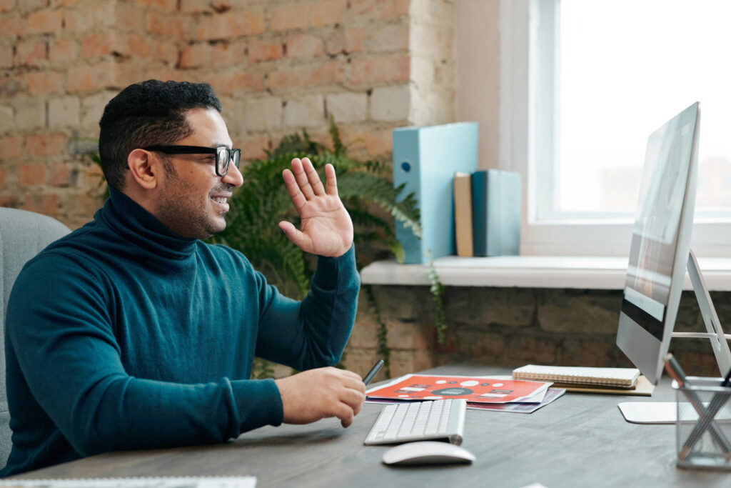 Man having an active learning experience with peers online
