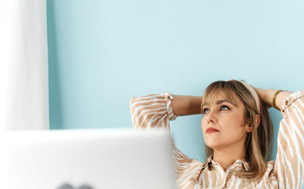 Bored woman, struggling with attention span during a passive learning experience