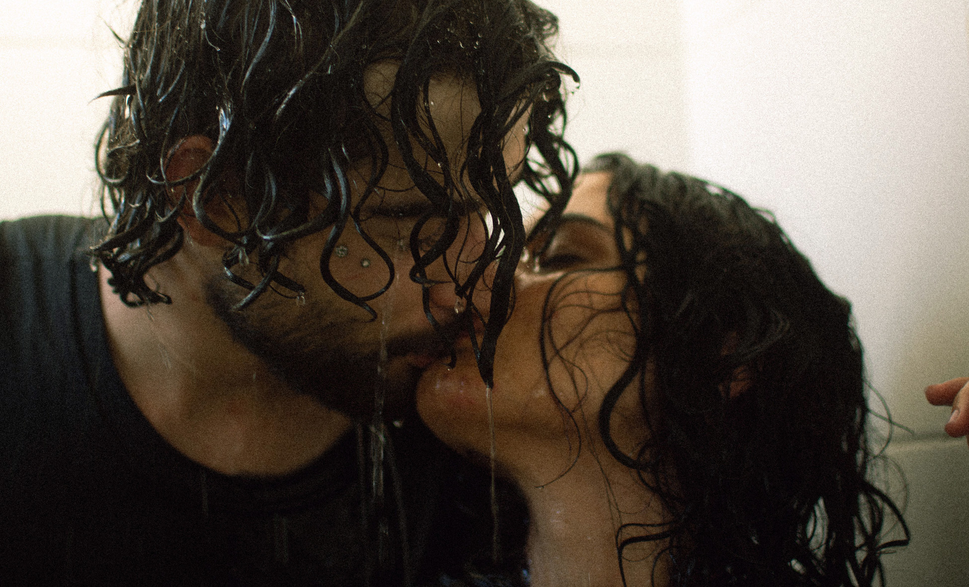 Kissing couple showcasing the benefits of BDSM