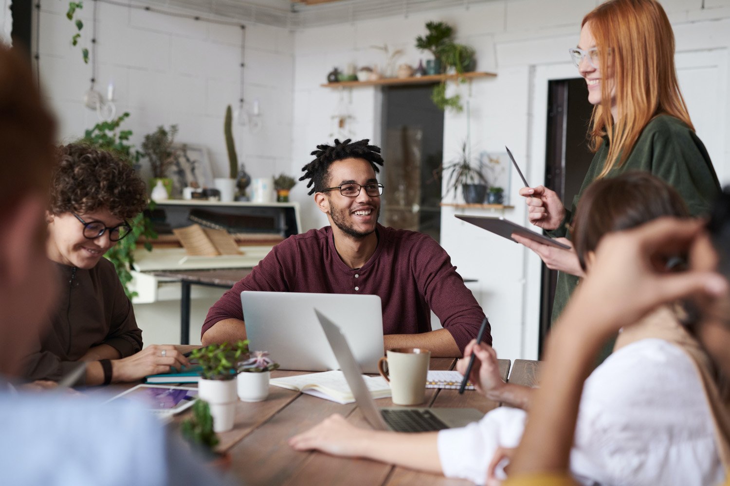 Business coach working with clients