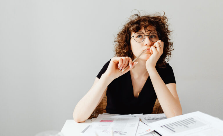 Woman thinking about a career pivot
