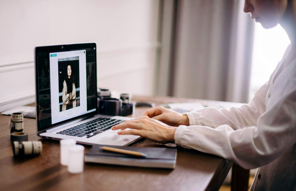 Woman creating her brand materials for her website