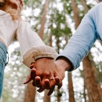 Couple holding hands