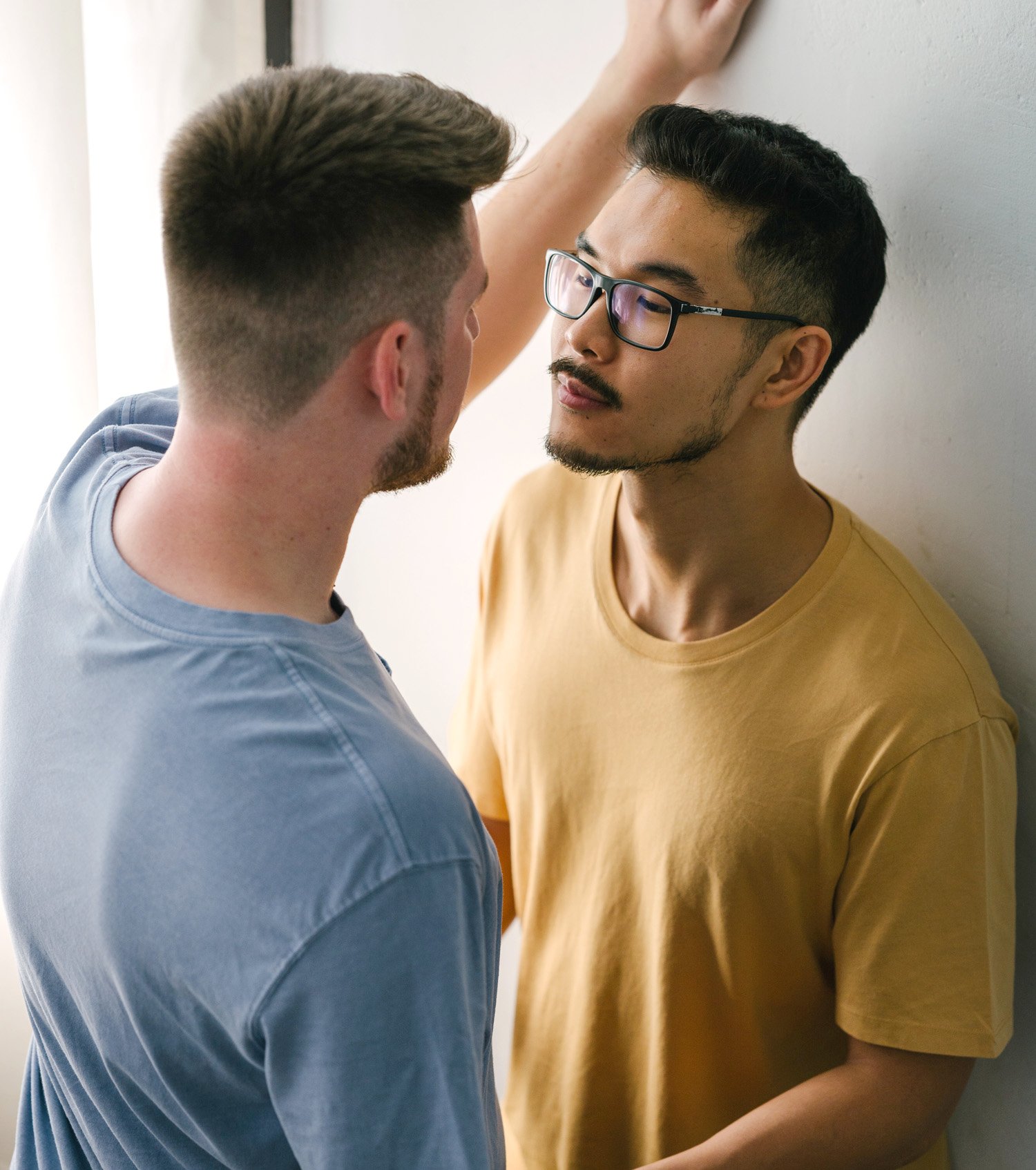 Gay couple doing an intimacy exercise as homework
