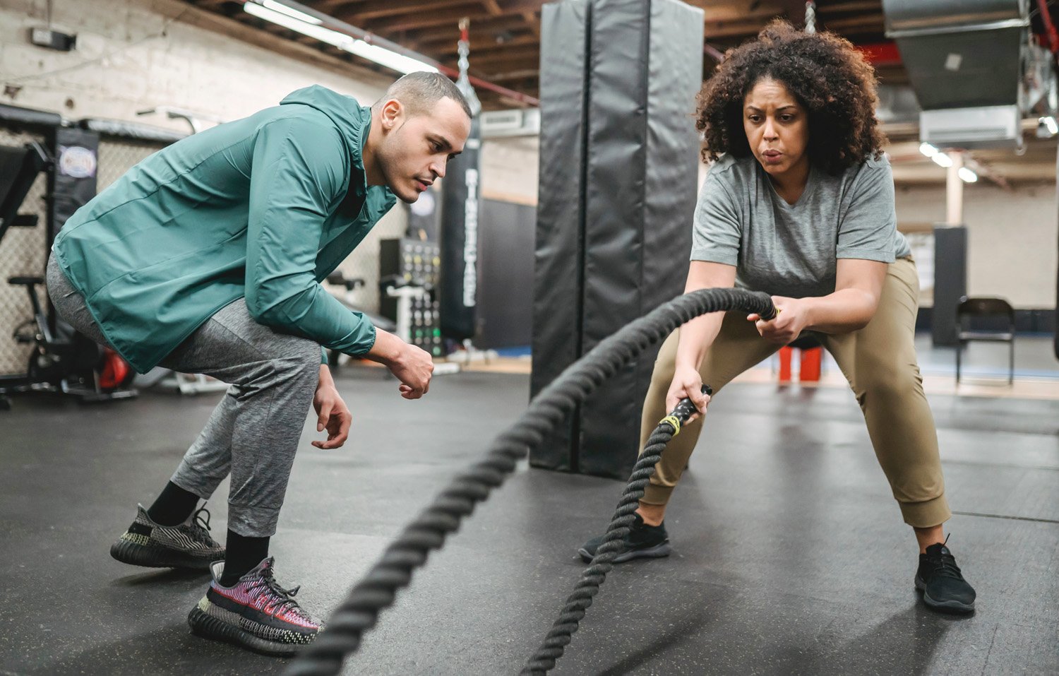 Fitness coach and client working out