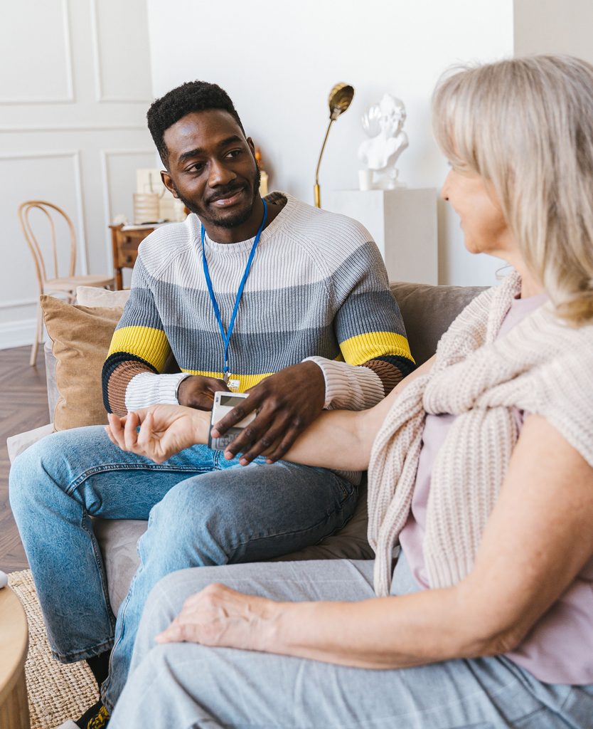 Young social worker with a client