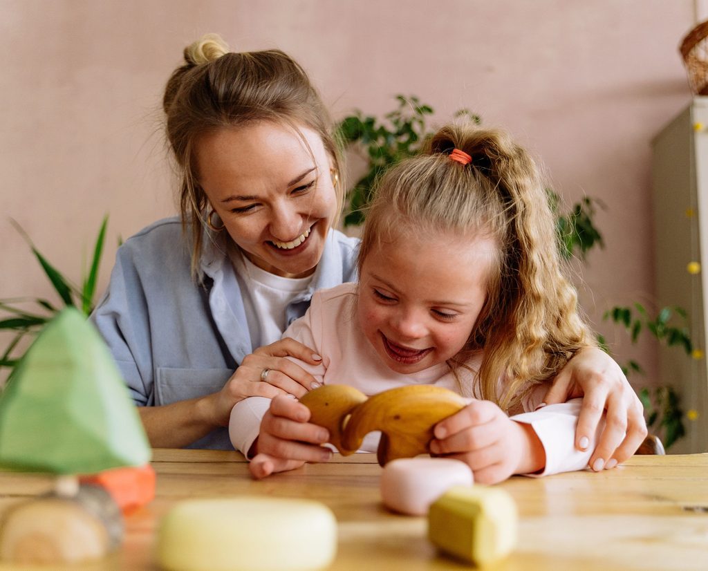 Special education teacher with child