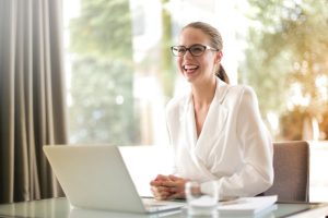 Happy woman making a career change to sex coaching