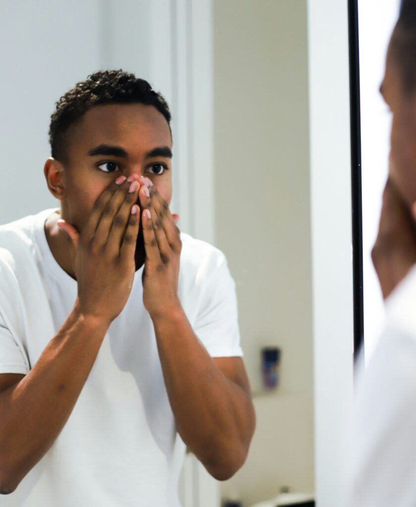 Young black man, struggling with confidence
