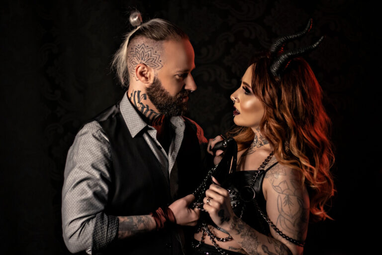 Kinky couple demonstrating the psychology of BDSM