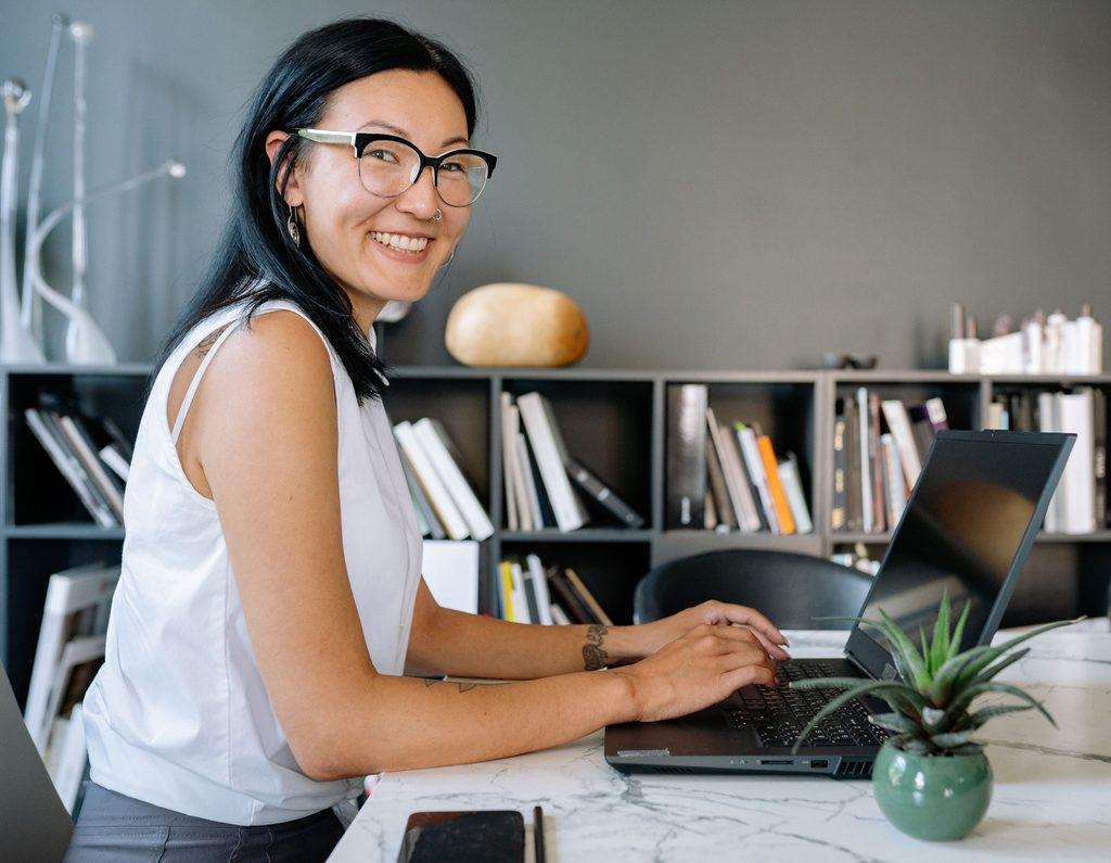 Woman sex coach at work, enjoying the professional infrastructure that allows her to practice successfully.