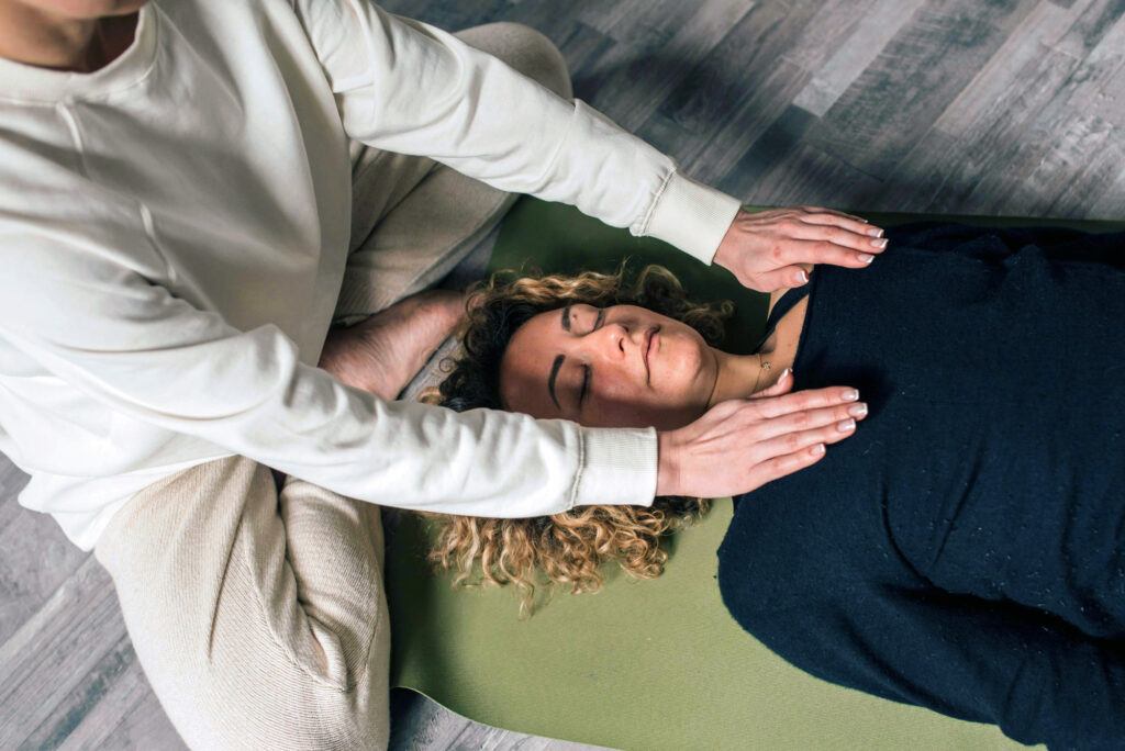 Client and practitioner in a somatic therapy session