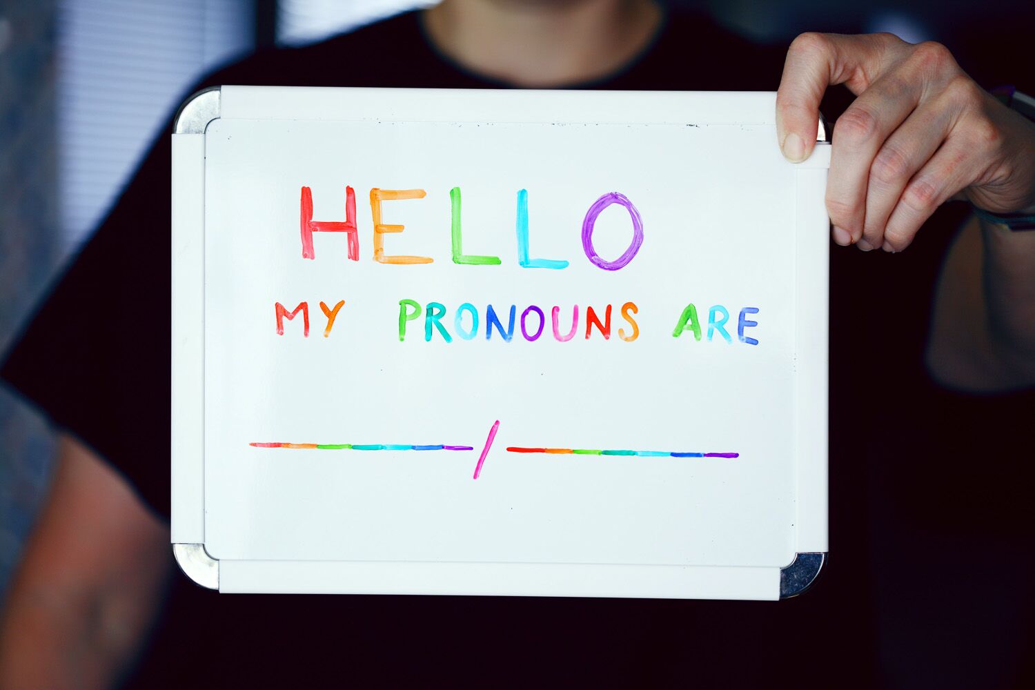 Pronouns sign in a trans inclusive coaching practice
