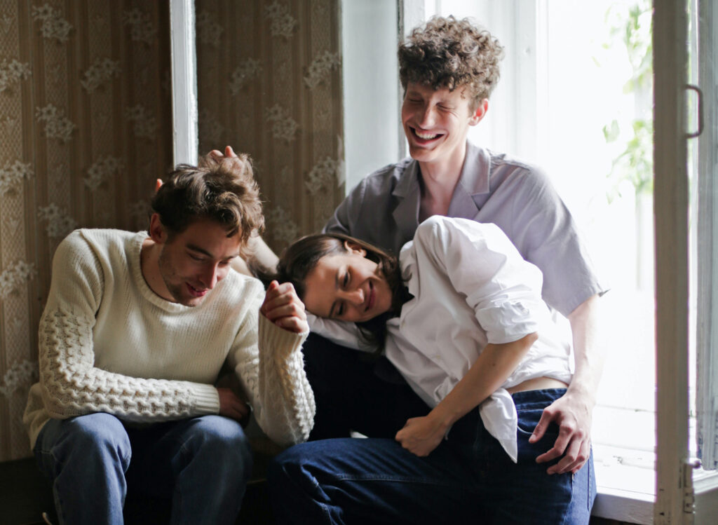 young polyamorous throuple